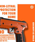 Top Shelf Non Lethal Kinetic Launcher Setup For Real Talk Home Defense And Street Smart Personal Protection With Sticky Honeycomb Grip Fast Aim Optics Orange Design Proudly Made In Usa, orange launcher with trigger, safety features.