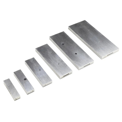 Six Piece Steel Parallel Set From 3/8 Inch To 2-1/4 Inch, Hardened To.0002 Inch, Precision Ground Tool Steel On White Background