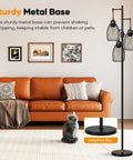 Dimmable Farmhouse Industrial Floor Lamp with Teardrop Cage in living room, sturdy metal base, fits modern decor, black.