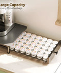 Coffee Pod Drawer Organizer For K Cup Pods, 35 Capacity Sliding Mesh Storage Basket under a coffee maker on kitchen counter