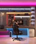 Dope RGBW COB LED Strip Light With 3000K Warm White 896 LEDs Per Meter decorates a modern gaming setup with vibrant colors