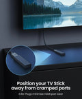 Heavy Duty HDMI Extension Cable 3.3 Feet connecting to TV stick, minimizing port wear and enabling clean setup in crowded space.