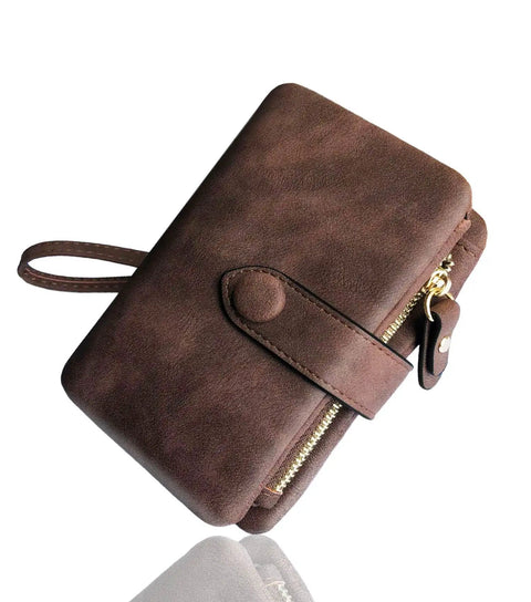 Must Have Women's Small Bifold Leather Wallet With RFID Blocking And Wristlet Strap, brown PU leather exterior, closed view.