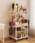 Three Tier Rolling Utility Cart With Wooden Drawer in white used as makeup storage, with cosmetics and bottles displayed on tiers
