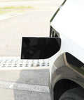 Fresh Glossy Black EV Charging Port Cover Trim Compatible With Kia EV9 2024 2025 2026 displayed on electric vehicle.