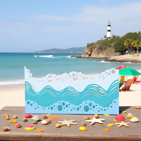Beach Wave Metal Cutting Dies Set For Scrapbooking And Card Making on a beach background with sea shells and lighthouse.