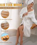 Woman sitting on 20 Inch Teak Folding Shower Seat Wall Mounted Fold Down Bench For Small Bathrooms Built Tough Teak Wood Stool Inside Shower Heavy Duty Stainless Steel Frame Supports Up To 440 Lbs.