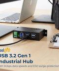Heavy Duty Four Port USB 3.0 Hub Drives Serious 5Gbps Speeds, Clad In A Rugged Metal Casing With 15KV ESD Shielding, Accepts 7 To 48V DC Input.