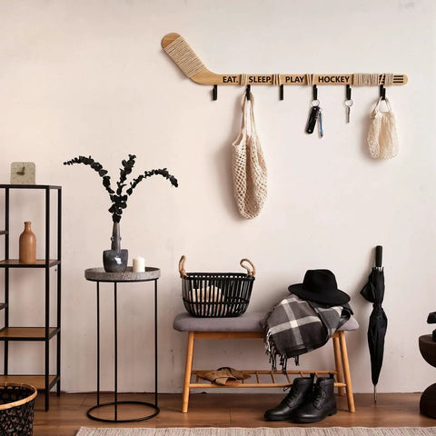 Top Shelf Hockey Stick Coat Rack Featuring Six Rock Solid Hooks Ideal For Dropping Your Jackets Hats And Gear Quick Wall Mounted Storage Piece That Saves Floor Space And Keeps Your Entryway Clean, decorated with bags and accessories.