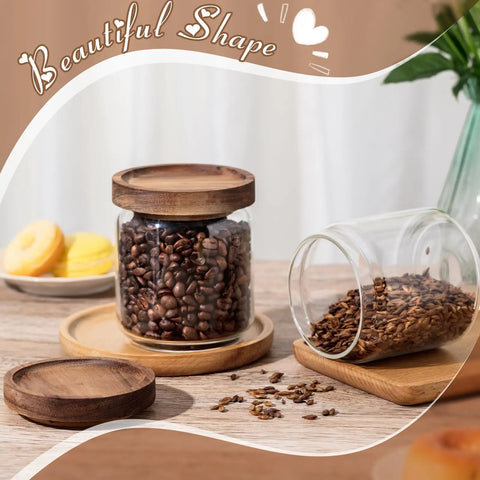 24 Pack Glass Canister Set With Tight Wood Lids For A No Sweat Pantry Setup, 17 Oz Food Jars with coffee beans on display.