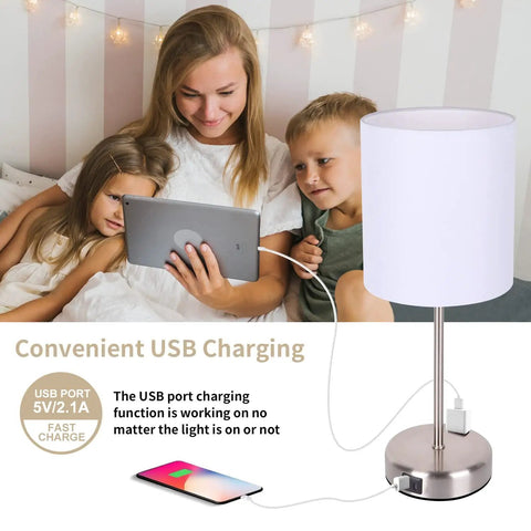 Set Of Two Bedside Lamps With Easy Tap Control 3 Way Dimmable USB A And USB C Charging Ports E26 LED Bulbs Included next to family using tablet