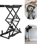 Built Tough Electric Scissor Lift Table Hauls 140 Lbs And Rises From 10 To 50 Inches Like Butter in black steel, ideal for grooming or photography.