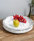 14 Inch White Distressed Round Lazy Susan Real Deal Farmhouse Turntable Smooth Spinning Wooden Serving Tray with fruit on a table