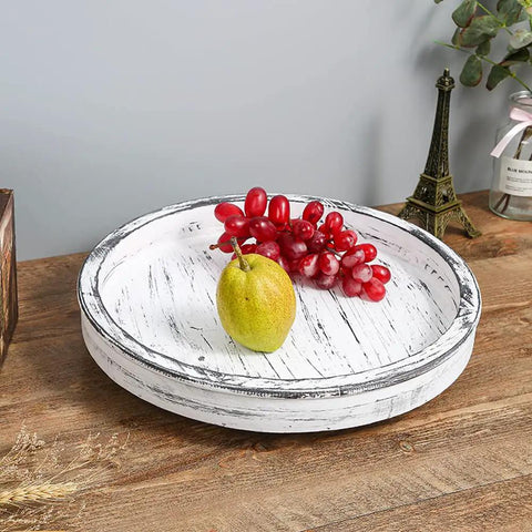 14 Inch White Distressed Round Lazy Susan Real Deal Farmhouse Turntable Smooth Spinning Wooden Serving Tray with fruit on a table