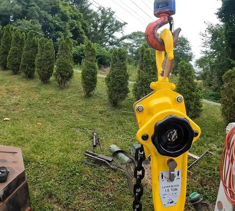 Two Pack Viking Manual Lever Chain Hoist 1.5 Ton Lift with heavy duty hooks in outdoor setting