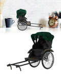 Retro Alloy Rickshaw Model Miniature Decor Showcasing Legit Vintage Charm And Dope Zinc Construction Perfect For Adding Cool Shelf Appeal Or Making A Solid Nostalgic Display Accent In Black, detailed view on a desk.