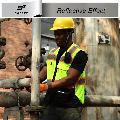 Heavy Duty Ansi Class Two High Visibility Safety Vest With Nine Pockets And Reinforced 360 Degree Reflective Strips Built Like A Tank For Construction Crews Who Need To Shine Bright And Crush It On The Daily Without Any Sweat, worn by a worker using tools.