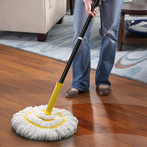 Person using Self Wringing Twist Mop With Long 57 Inch Handle Microfiber Floor Mop With Top Scrub Pad for hardwood cleaning.