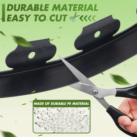 Scissors cutting 1.5 Inch Tall Landscape Edging 100 Ft No Dig Garden Border in black, highlighting durable PE material