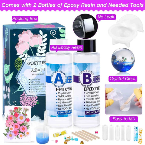Beginner Resin Craft Kit With Molds And Silicone For Epoxy Resin Projects Includes Dried Flowers Foil Flakes Necklace Cord Earring Hooks Plus Tools And Easy Instructions For DIY Jewelry Making; epoxy resin bottles, molds, and tools displayed.