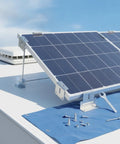 Offset Z Shaped Mounting Kit In Aluminum Alloy For RV And Marine Solar Panels, installed on RV roof with tools on blue tarp