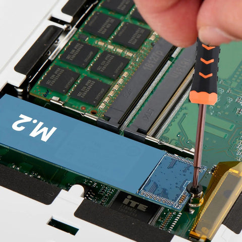 Ultimate M.2 NVMe SSD Screw Kit with Magnetic Screwdriver installing on motherboard