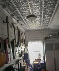 Copper Faux Tin PVC Ceiling Tiles 2x2 Glue Up Easy Install Paintable Tin Look Ceiling Tiles For Quick DIY Makeover Covers 40 Sq Ft No Mess Lightweight And Durable in a music room