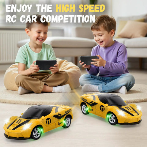 Two boys playing with Mini One Sixty Four Scale RC Car With 2.4GHz Remote Control And 3 Speed Modes Rechargeable Desktop Toy Race Car Gift For Boys Ages Four To Twelve Yellow on carpet