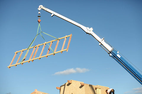Green Round Lifting Sling Strap 50 mm By 4 Ft Endless Webbing Heavy Duty Lift Sling used in construction with crane.