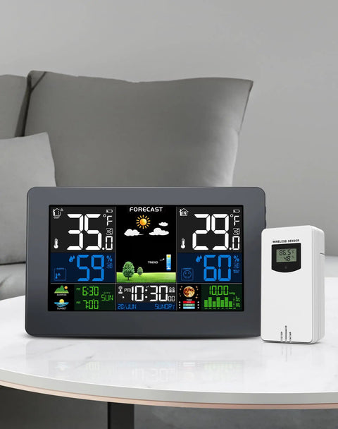 Hassle Free Wireless Remote Sensor Delivers Dead On Indoor Outdoor Temperature And Humidity Readings For Your Weather Station on table.