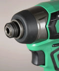 Close-up of Cordless 18V Impact Driver Sub-Compact Brushless, 1/4 In Hex, lightweight body showing metal chuck and green handle detail