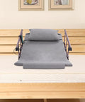Upgrade Your Sleep Game With This Electric Power Lifting Bed Back Rest at 45 degrees on a mattress, gray fabric, foldable guardrails.