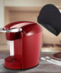 Slick Slide Mat For Keurig K Classic Coffee Maker Slider Pad Mover Extender Tray beside a red coffee maker on wood countertop.