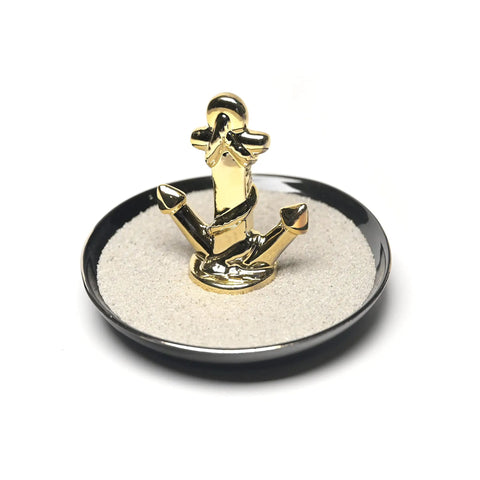 2 Lb Natural Decorative Sand For Interior Decor, Vase Fillers And DIY Crafts displayed with golden anchor figurine