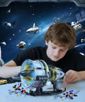 Boy assembling Jet Turbofan Engine Model Kit That Runs With App Control, Realistic Motor, Lighting Effects, 564 Plus Pieces
