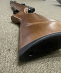 Wooden stock of Hard Hitting 25 Cal PCP Air Rifle With 3500 PSI Tank For Serious Power And Precision, Smooth Action, And Tight Groups