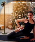 Yoga session by Christmas tree with Dope Rgb Floor Lamp With Double Side Lighting, Smart App Control, Multicolor Dimmable Led Standing Lamp For Living Room, Bedroom, Gaming Room And Office, 24W 2600Lm in background