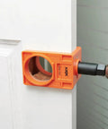 Pro Grade Door Lock Installation Kit With Adjustable Guide Template And Heavy Duty Hole Saws mounted on a white wooden door.