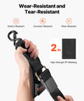 Hands holding Beefed Up Heavy Duty Boat Trailer Transom Straps 2 Pack, 2In X 24In Adjustable Tie Downs with S-Hooks.