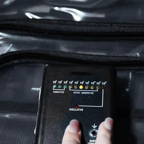 Keep Static Outta Your Circuit Boards With This Antistatic Clear Crossbody Tool Bag featuring a multimeter monitor in use.