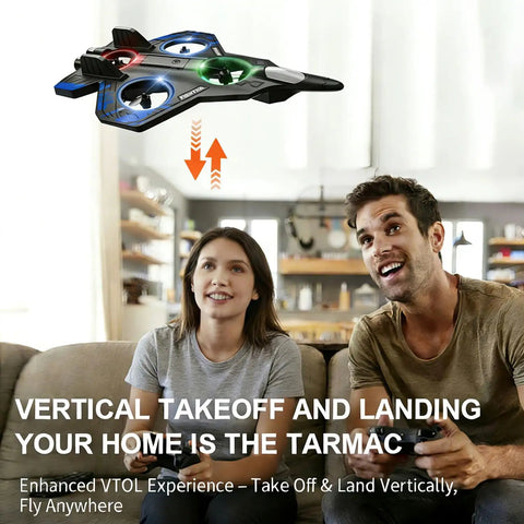 Couple flying Foam RC Airplane With Lights, 360 Flip Stunt Fighter Jet Drone indoors, showcasing vertical takeoff feature.