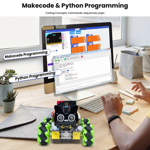 KEYESTUDIO Microbit V2 robot car 4WD Mecanum kit; black chassis with lime-green wheels on a desk beside a computer