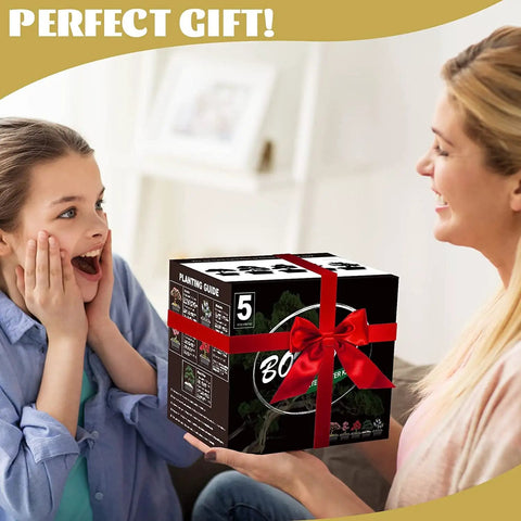Woman gifting Five Piece Bonsai Tree Kit With Self Watering Pots For Indoor Growth to excited child, featuring gift box with red bow