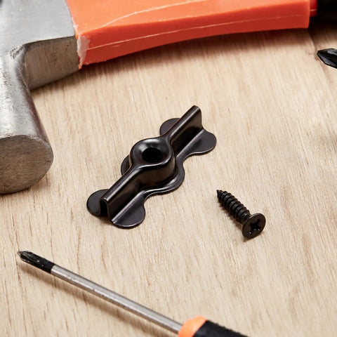 Rock Solid Black Double Wing Flush Mounting Clips With Phillips Screws 24 Piece Kit Made From Hardened Alloy Steel on a wooden surface.