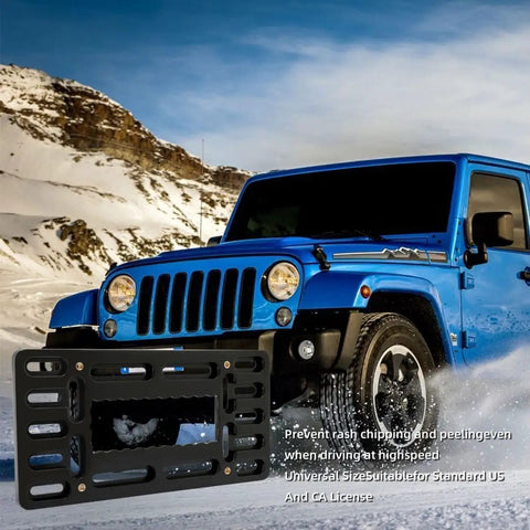 No Drill Front License Plate Bracket Kit for Cars, SUVs, Trucks displayed with blue SUV in snowy mountain terrain