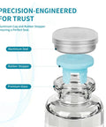 Exploded view of BISS closure for a 30ml premium glass vial showing aluminum seal and blue rubber stopper