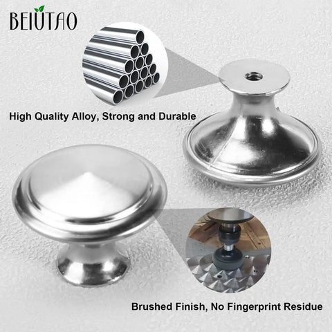 Close-up of Thirty Five Pack Brushed Nickel Cabinet Knobs 1-1/4 Inch Round Drawer Knobs with stainless steel top and zinc alloy base.