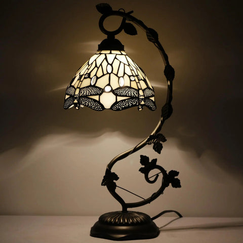 Amber Tiffany Style Dragonfly Table Lamp With Stained Glass Shade And Metal Leaf Base in bronze finish, illuminated