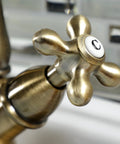 Close-up of handle on Heritage 4 Inch Plate Vessel Sink Faucet Deck Mount Brushed Nickel With Two Handles Drip Free Ceramic Cartridge