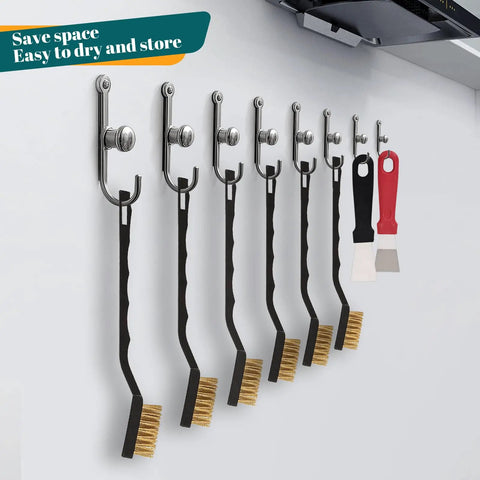 12 Piece Mini Brass Brush Set With Curved Handles And 2 Cleaning Scrapers hung on wall hooks